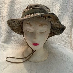 Camouflage Hat size 7 & 3/4. Drawstring goes under chin. Places for lures, etc.